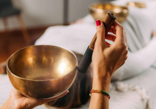 woman-playing-tibetan-singing-bowl-in-sound-healing-royalty-free-image-1673608575